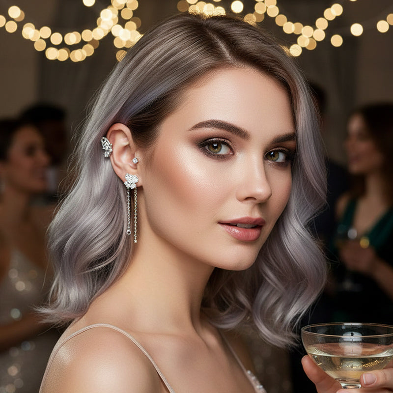 Boucles d'oreilles avec zircone et pompons en forme de papillons