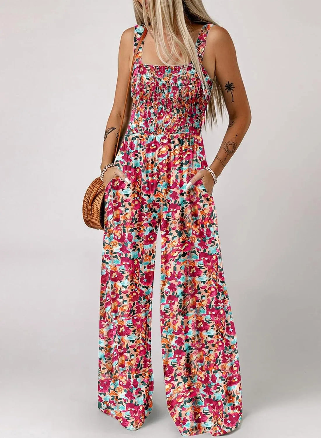 DE REDUZIERUNG Ärmelloser Damen-Jumpsuit mit Blumenmuster, gesmokter Brust und weitem Bein, sommerlich schick
