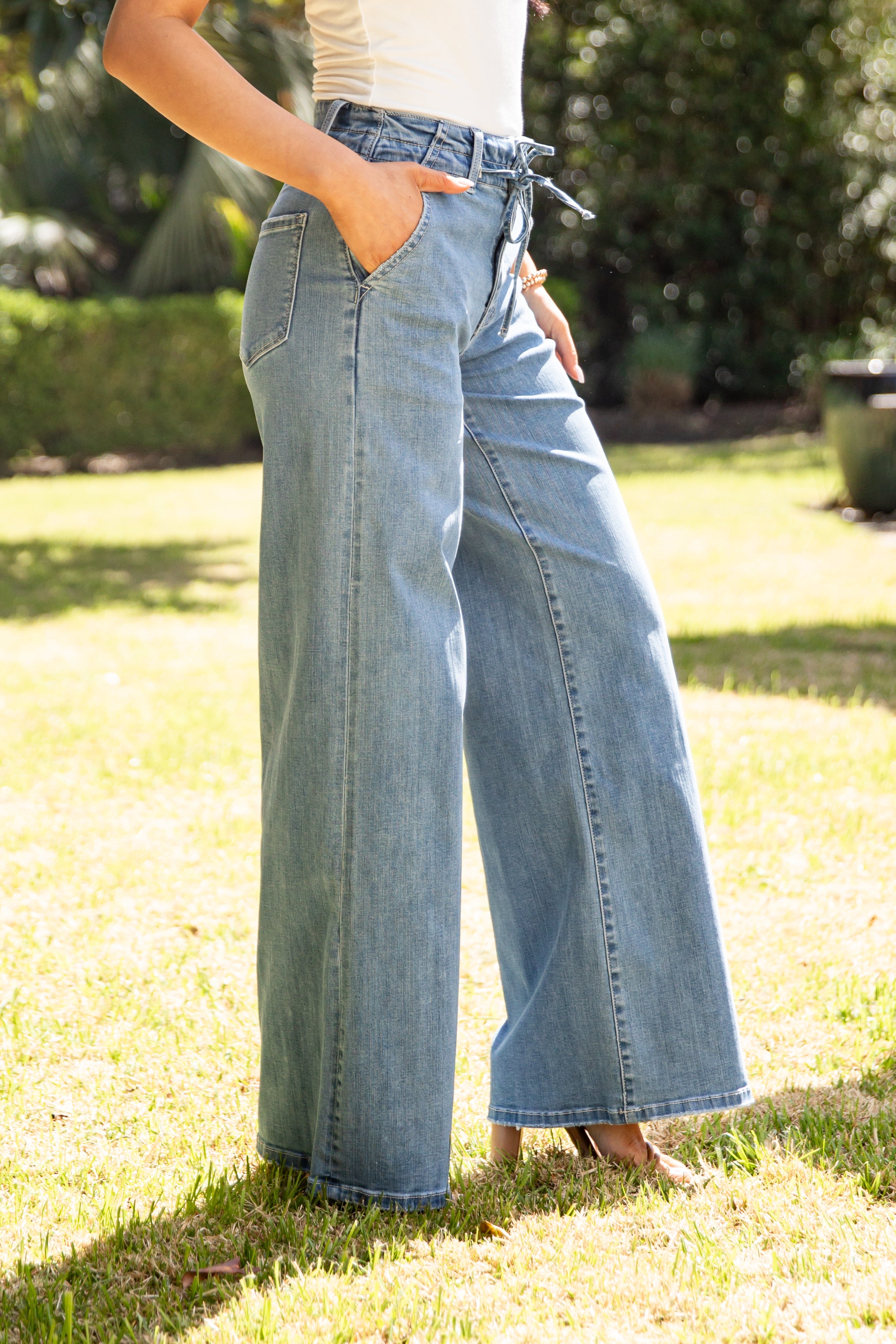 Jesse High Rise Light Wash Tie Waist Palazzo Jeans