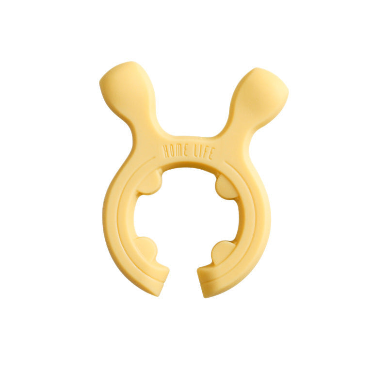 Support multifonction en silicone pour poignes de casseroles et spatules