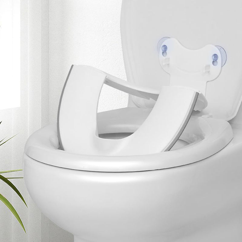 DE RDUCTION Faltbarer und tragbarer Toilettensitz für Kinder