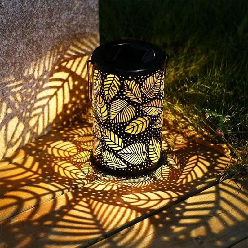 Lanterne solaire suspendue avec motif ombre et design creux