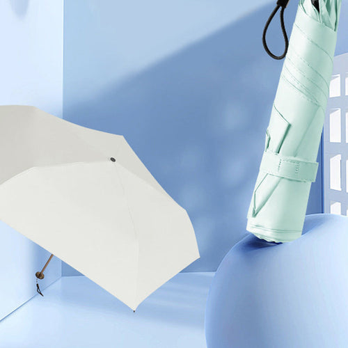 An ultra-light (103g), portable, all-season protective umbrella—UV-resistant, durable, and suitable for both sun and rain—your pocket-sized personal "bodyguard."