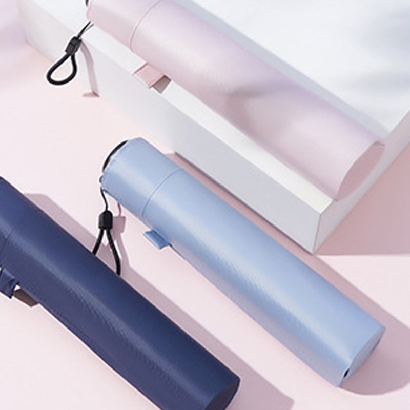 An ultra-light (103g), portable, all-season protective umbrella—UV-resistant, durable, and suitable for both sun and rain—your pocket-sized personal "bodyguard."